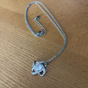 Elegant Silver Necklace with Intricate Pendant